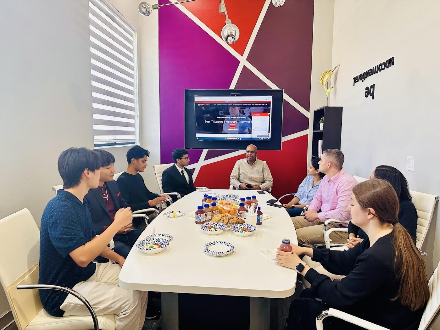 Ighty Support team collaborating in office