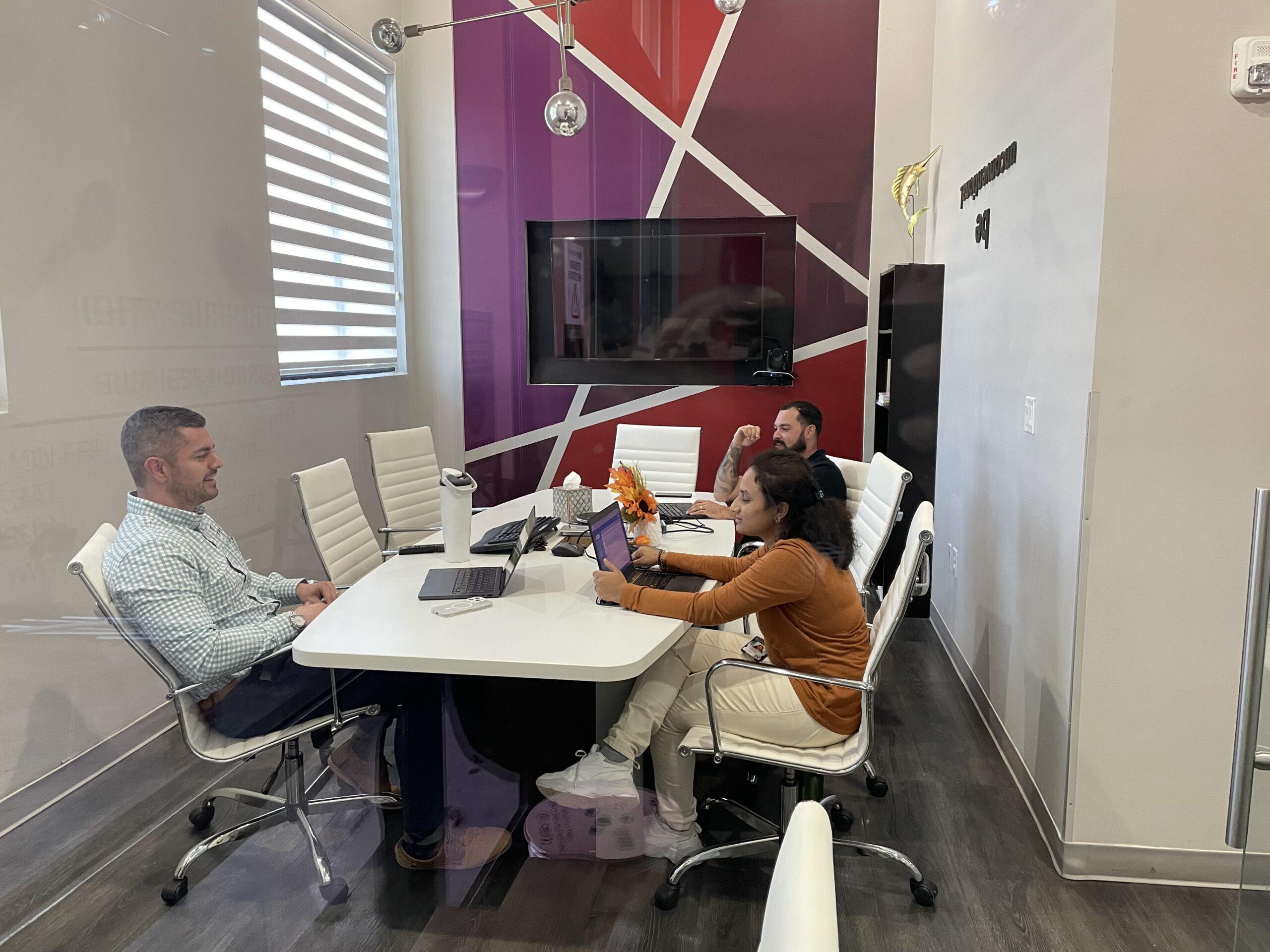 Team collaborating at Ighty Support